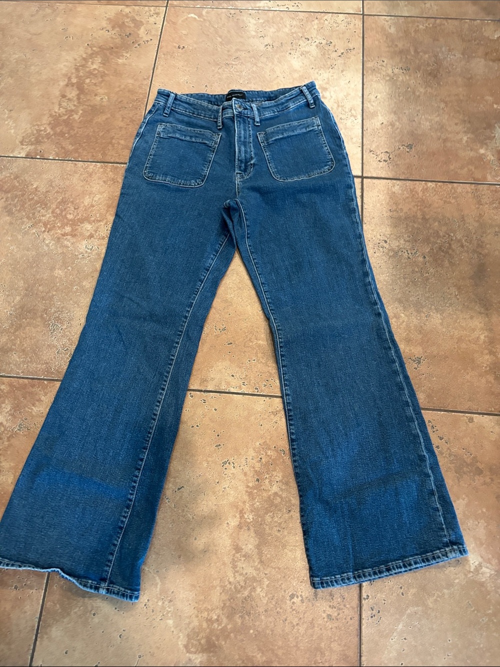 High-Rise Blue Flare Jeans with Front Patch Pockets
